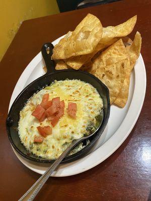 Spinach and artichoke dip with homemade chips