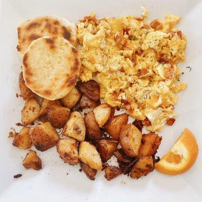 Scrambled eggs with chorizo, home fries and a biscuit