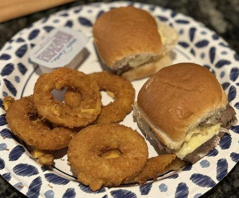 Double cheeseburger (slider) with jalapeño cheddar and the new cheese rings with zesty sauce.