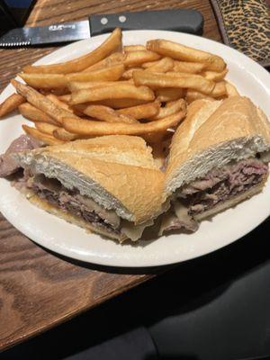 Prime Rib Sandwich with seasoned fries.