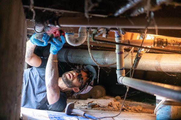 After using acidic Chemicals in his galvanized line, I needed to repair a sink line in a crawl space for happy Customer!