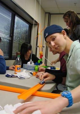 One of our students enjoying the Rube Goldberg project Fun Friday event!