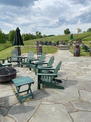 Lots of outdoor seating and Adirondack chairs