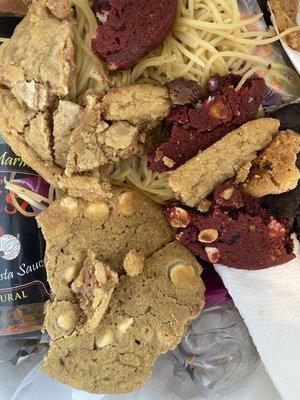 Cookies in the trash can with old spaghetti. Sadness.