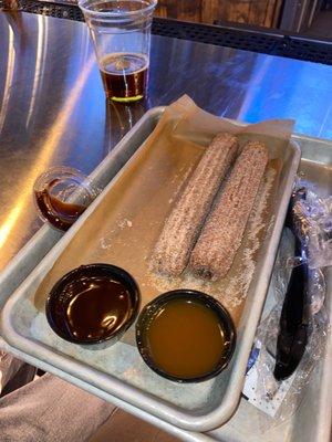 Churros with chocolate and caramel dipping sauce