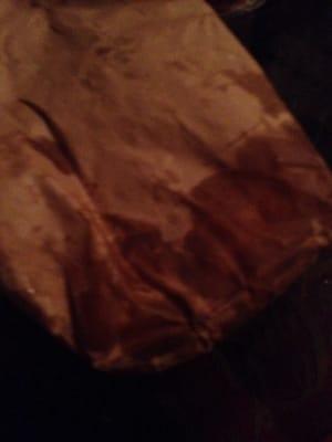 Grease at the bottom of the bag because fries are thrown into there