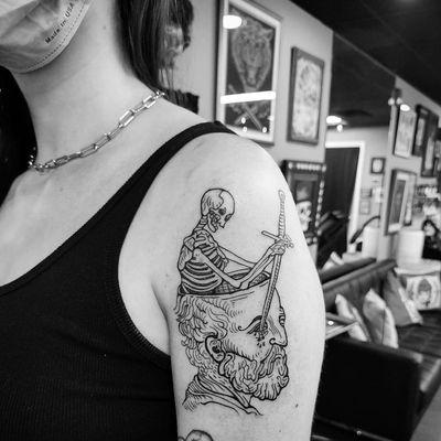 Etching-style tattoo by Victoria.