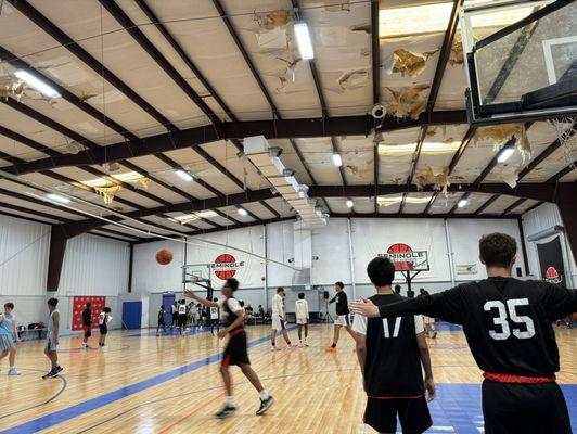 Two courts with barely enough space for the boys to shoot 3 point shots