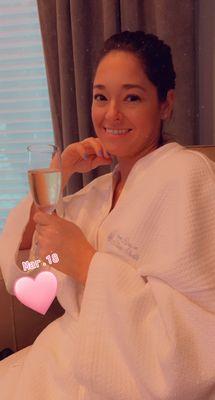 Relaxing at the back of the spa before or after your massage while enjoying a delicious lavender glass of champagne