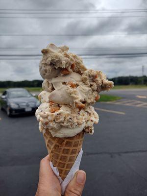 Small Grandma Pat's butterscotch and butterfinger in a waffle cone