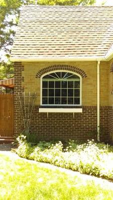 Unique wood window shape. This required a specific pattern to be taken in order for the glass to be custom cut!