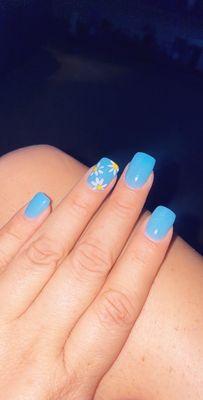 Daisies on my dip powder nails!!  Always a great service!