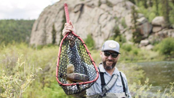 Cleaning up what other left behind in 11 mile Canyon in my South Platte Fly Shop hat.