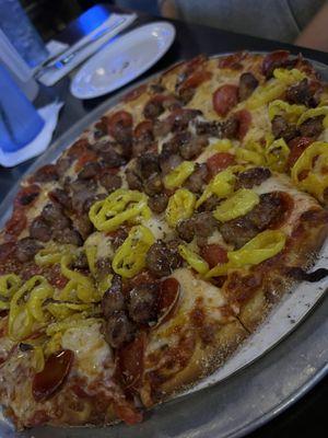 Sausage pepperoni and banana pepper pizza