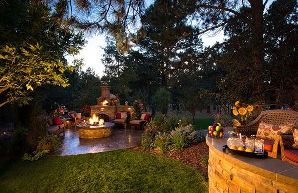 Patio, fire pit, pizza oven, outdoor lighting.