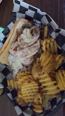 Philly cheese steak was ok waffle fries yum