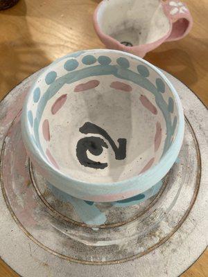 A cup I glazed. I haven't picked it up yet so I don't know the final product