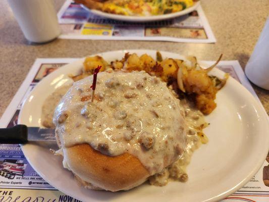 Sausage parries on bagel with sausage gravy. Caprese potatoes