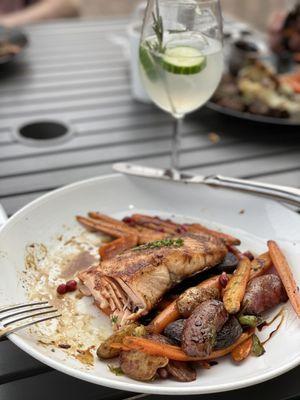 Pomegranate molasses salmon with standard fingerling potatoes and substitute item (glazed heirloom carrots); cucumber tonic