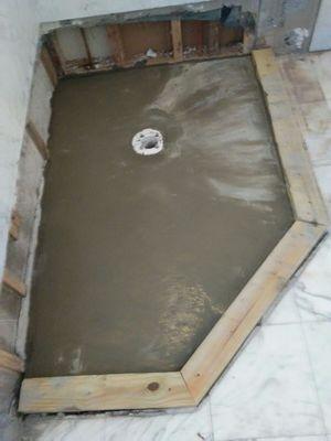 Pour Concrete  before installing shower pan