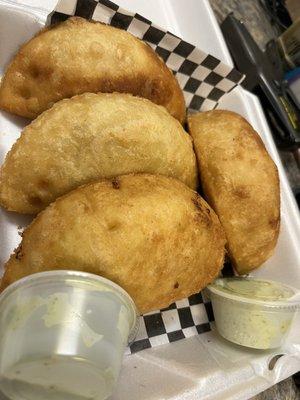 Assorted savory empanadas: chicken, shredded beef and cheese