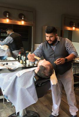 Master Barber Vic performing The Old Fashioned Shave.