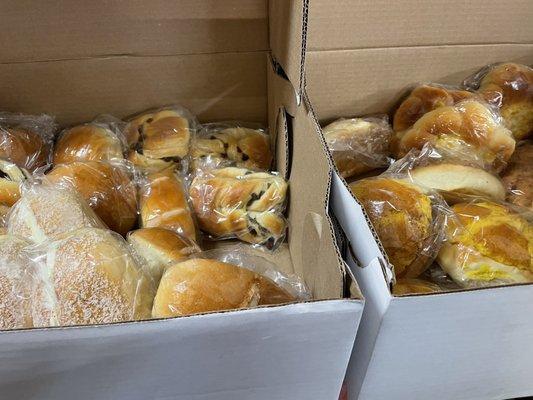 Assorted Chinese bakery buns. Yummy!  Coconut cream, cocktail bun, raisin braid, pineapple buns, yube bun, ham and corn buns in this pic