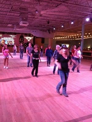 They have dance lessons for line dancing and couples dancing with two-step, swing, etc.  It's a huge dance floor.