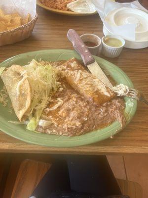 Ground beef enchiladas and ground beef taco, rice & beans.