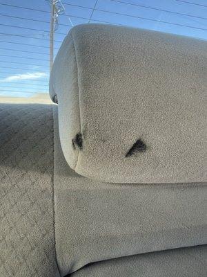 Cloth head rest with grease marks made by the Toyota mechanics.