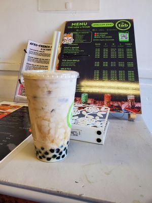 Large Jasmine milk tea with boba.