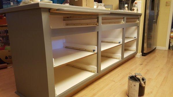 Cabinets: Re-paint from golden oak to grey and white dura poxy.