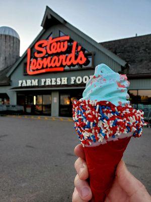 Firecracker Cone-Red velvet cone dipped in white chocolate, sprinkles. - Blue cotton candy ice cream  - Topped w/strawberry pop rocks