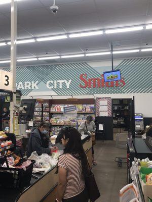 Smiths park city big store slow checkout but friendly cashier no baggers & 1 pm