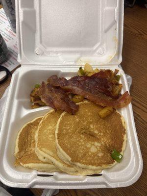 Pancake platter with no cheese and extra bacon potatoes on the side