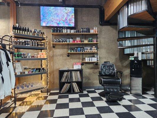 Sitting area with barbershop chairs.