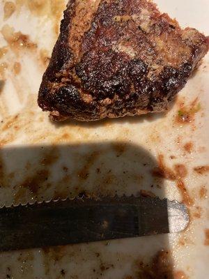 Steak so hard it will break your teeth Kitchen needs a better grill cook and to use less Pam(spray cooking oil) directly on the steak