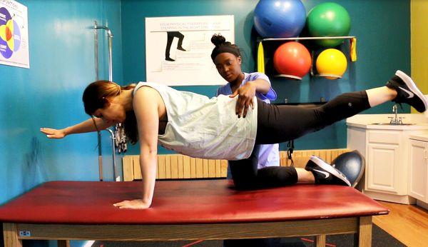 Stretching in our physical therapy room