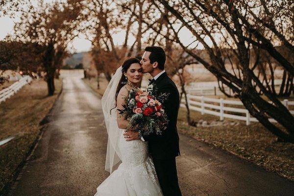 A beautiful bride and her Bliss bouquet.