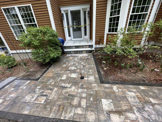 New walkway with border/New front granite steps with veneer