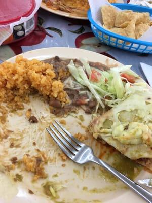 Half finished carne Asada wet burrito with rice and bean combination. LOVED IT!!!