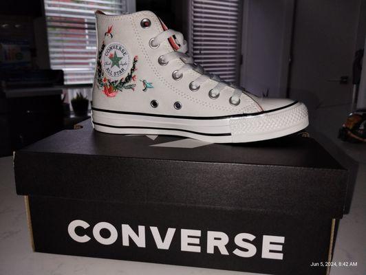 Embroidered Chuck Taylor Converse.