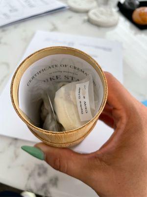 Ashes with cremation certificate and ID tag