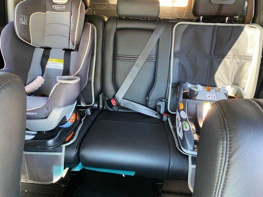 Rear seat with grommets car seats