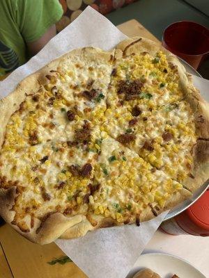 Seasonal corn pizza with bacon