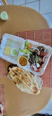 Take out! 1 of 3 meals. Delicious lunch combo. Chicken and lamb. Comes with rice salad, bread and a side. Our favorite I eggplant!