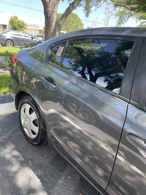 View of back passenger side door and window.