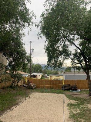 Backyard with view of mountain and volleyball court