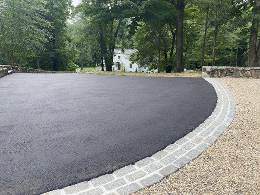 Paved driveway and installed Belgian block