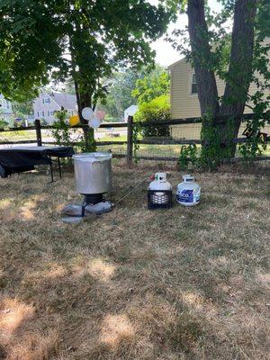 The provided pot with the food and provided burner/ propane.